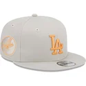 new-era-flat-brim-orange-logo-9fifty-side-patch-los-angeles-dodgers-mlb-beige-snapback-cap