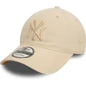 new-era-curved-brim-9twenty-league-essential-new-york-yankees-mlb-beige-adjustable-cap-with-beige-logo